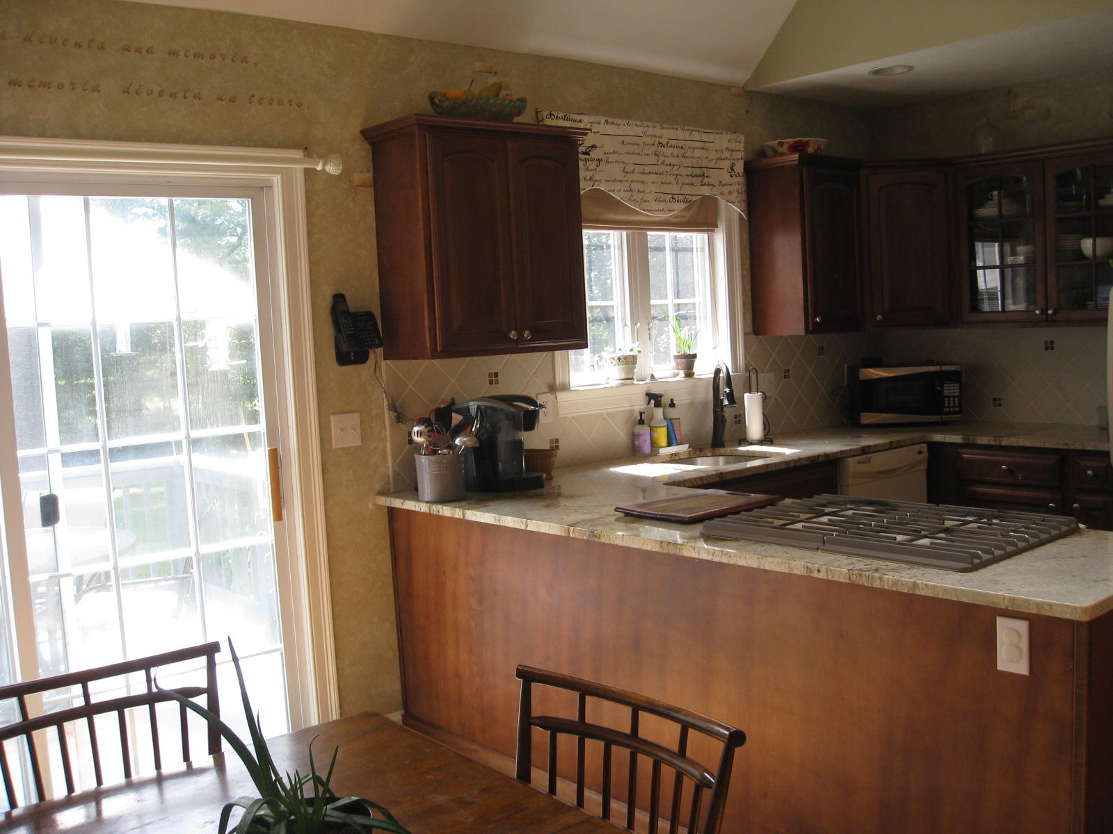58 Papermill Road Wareham, MA 02576 - Photo 9 of 26 a kitchen with stainless steel appliances granite countertop a sink a stove a refrigerator wooden cabinets and a granite counter top