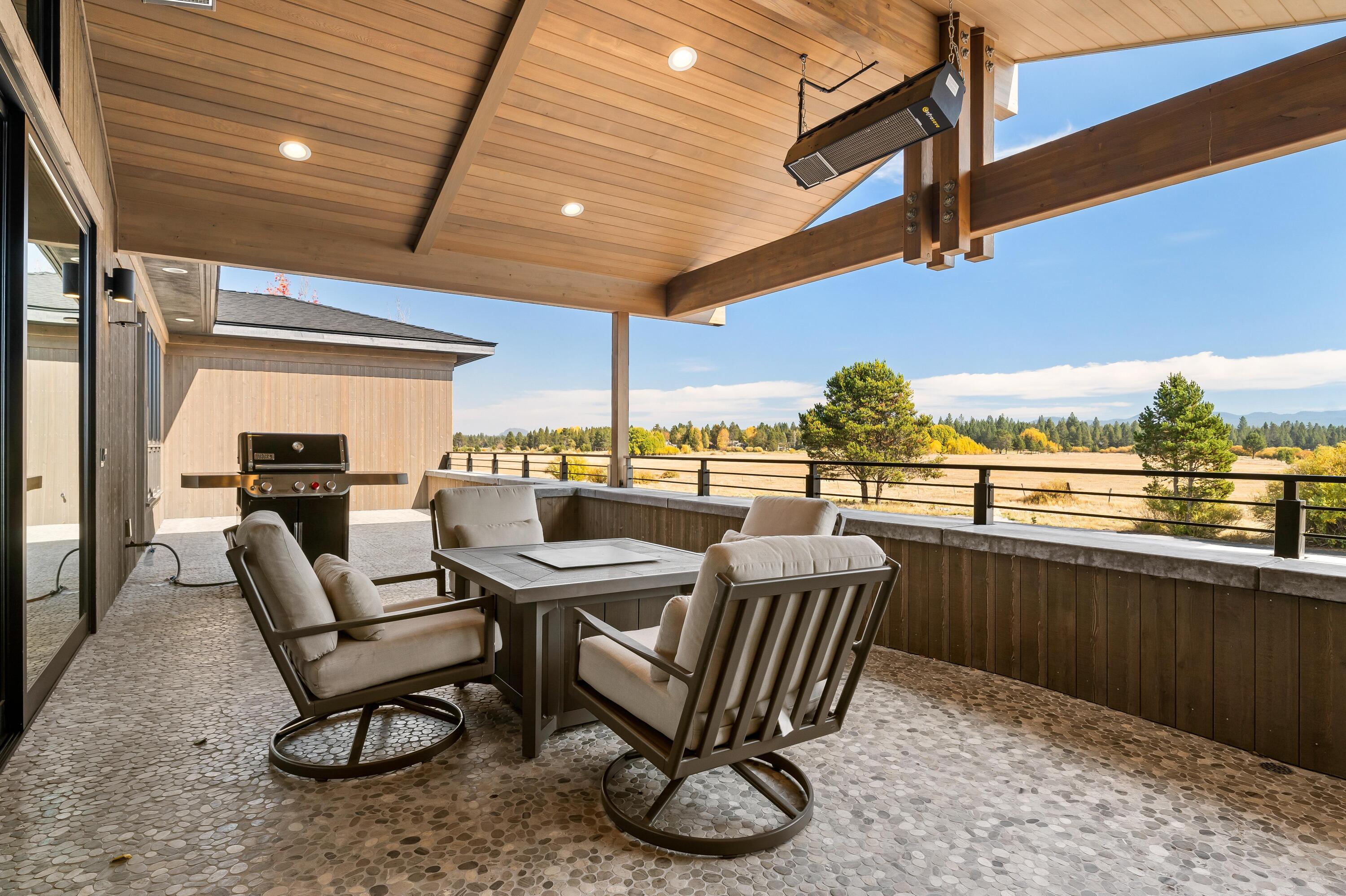 56878 River Road, Unit 2 Sunriver, OR 97707 - Photo 25 of 67 Barbecuing while taking in the picturesque views.