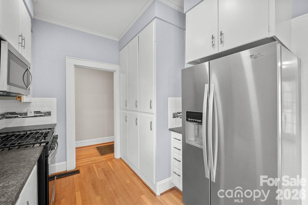 333 7th Street Northwest Hickory, NC 28601 - Photo 9 of 23 a kitchen with stainless steel appliances granite countertop a refrigerator and a stove