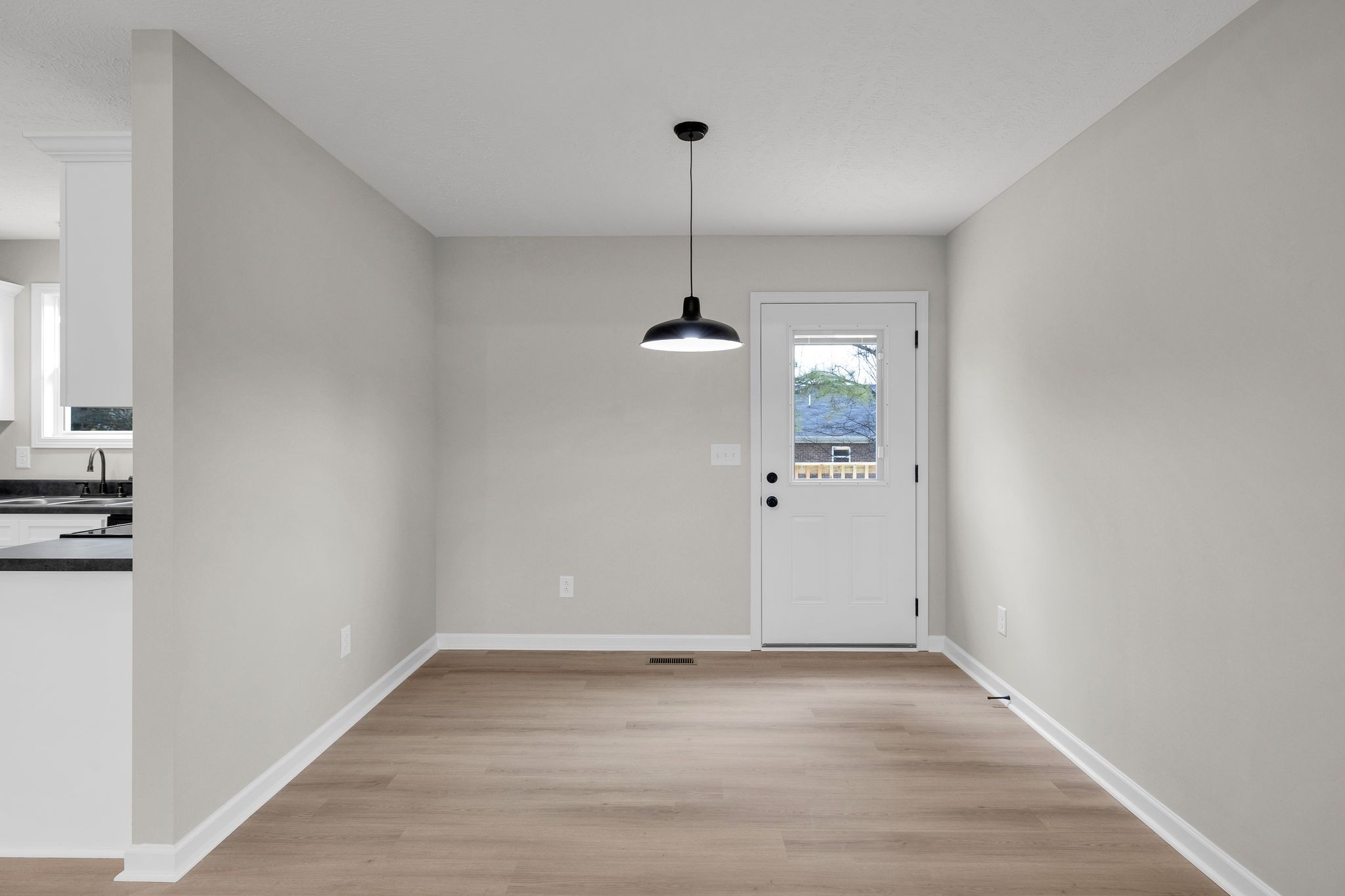 1536 Old Columbia Road Lewisburg, TN 37091 - Photo 12 of 22 a view of an empty room with wooden floor and windows