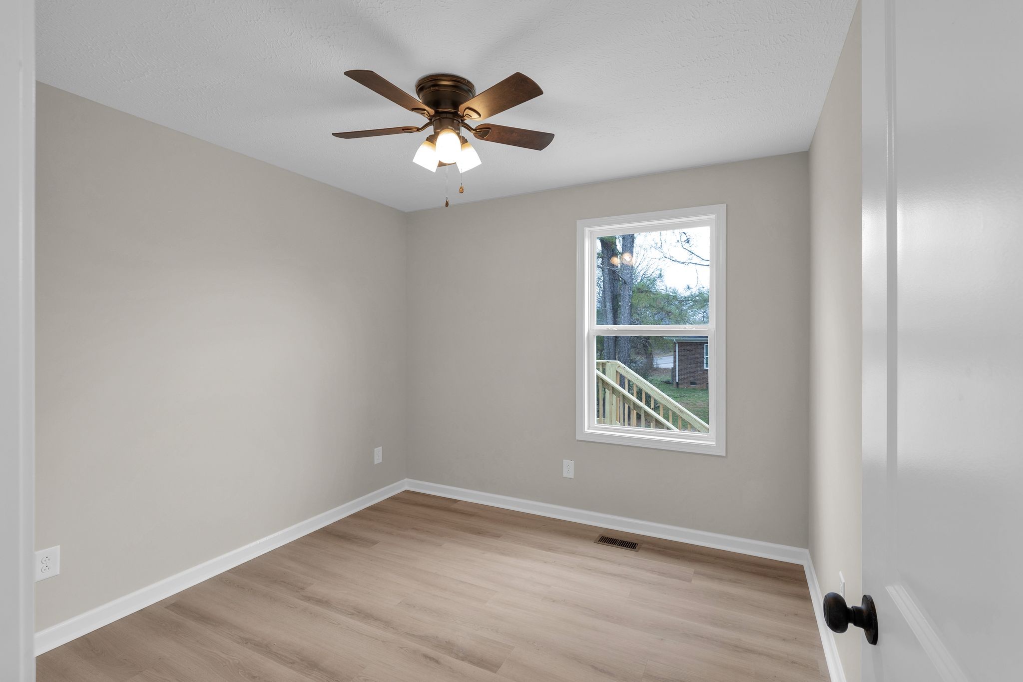 1536 Old Columbia Road Lewisburg, TN 37091 - Photo 16 of 22 wooden floor in an empty room with a window