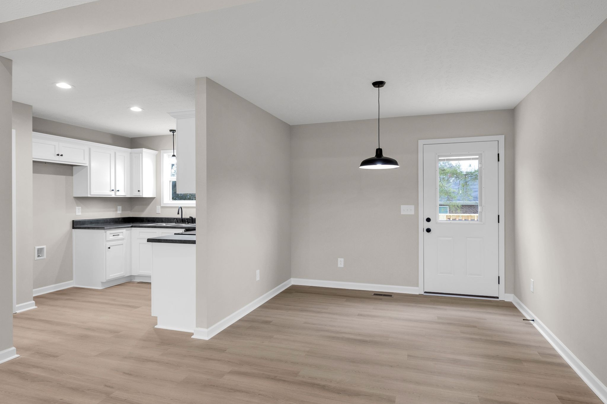 1536 Old Columbia Road Lewisburg, TN 37091 - Photo 10 of 22 a kitchen with a refrigerator and chandelier