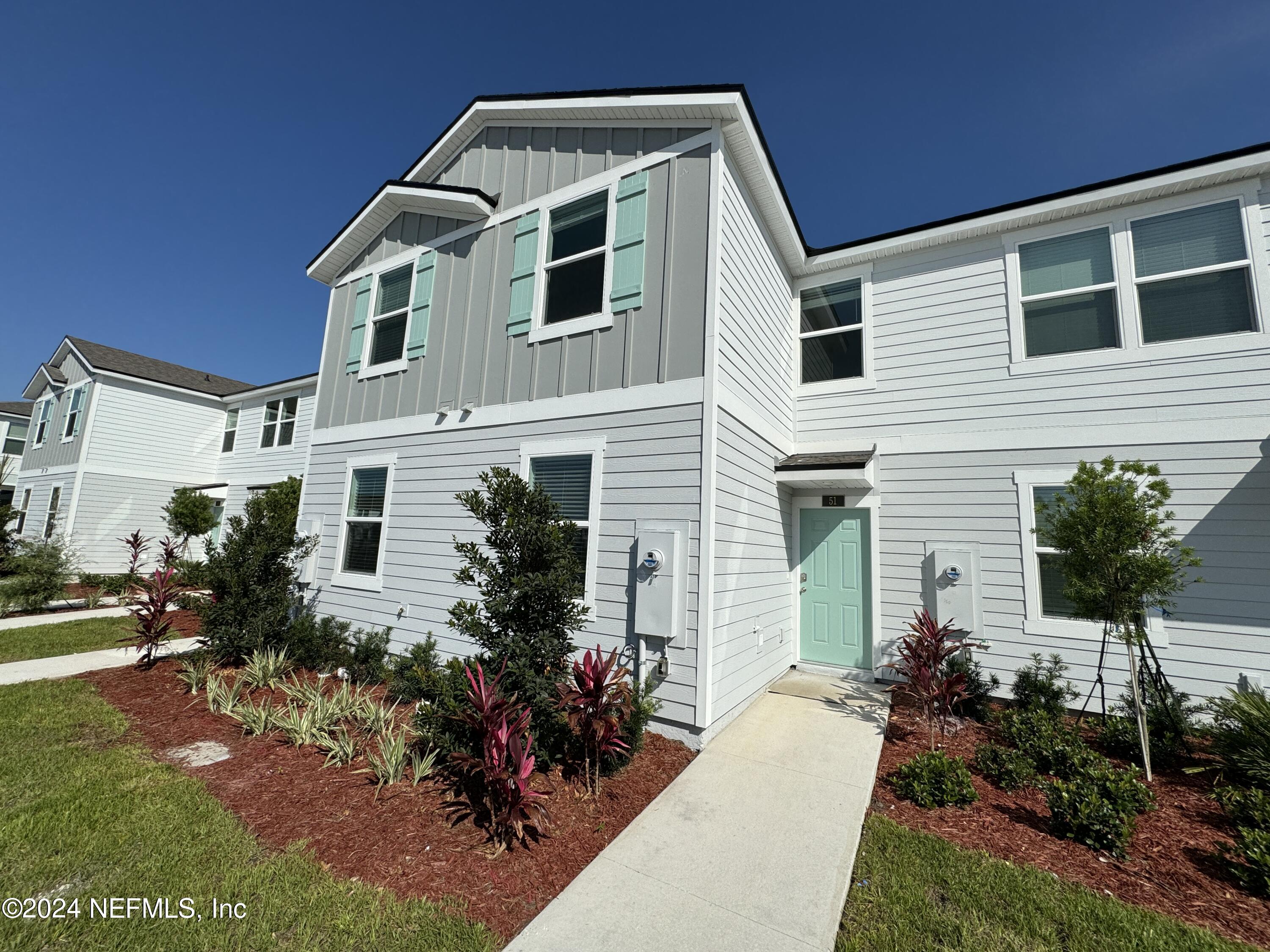 51 Hidden Mdws Road St. Augustine, FL 32095 - Photo 1 of 1 a front view of a house with a yard