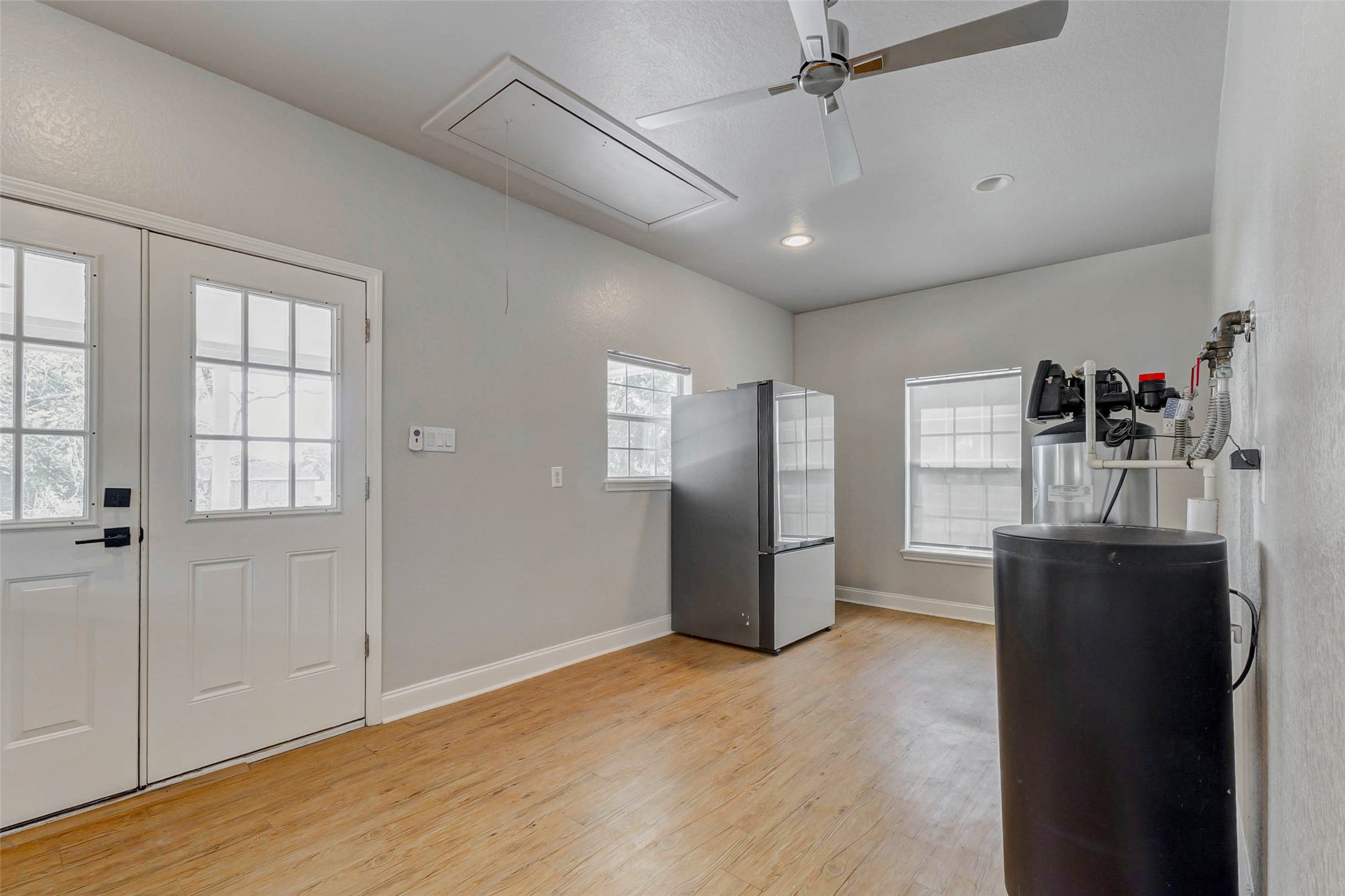 8411 Syms Street Fulshear, TX 77441 - Photo 15 of 29 a view of a livingroom with a fireplace