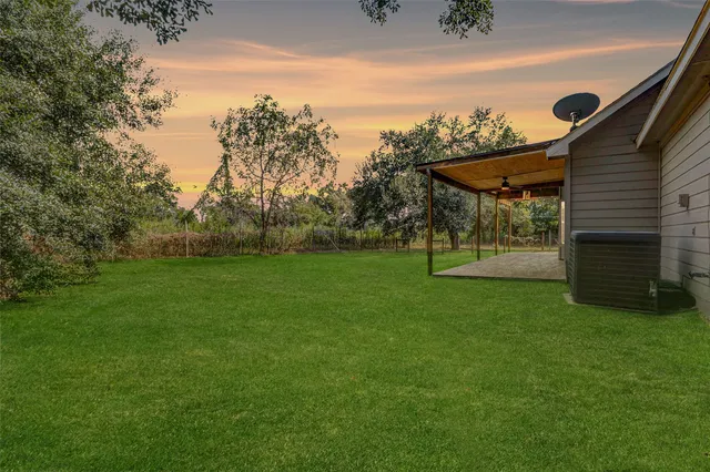 a view of a backyard with a garden