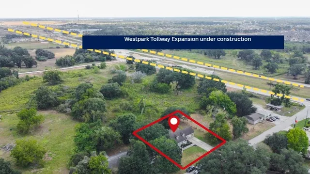 a view of swimming pool from a balcony