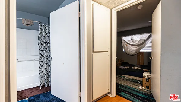 a close view of a utility room with washer and dryer