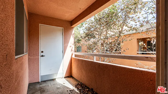 a view of a living room and a window