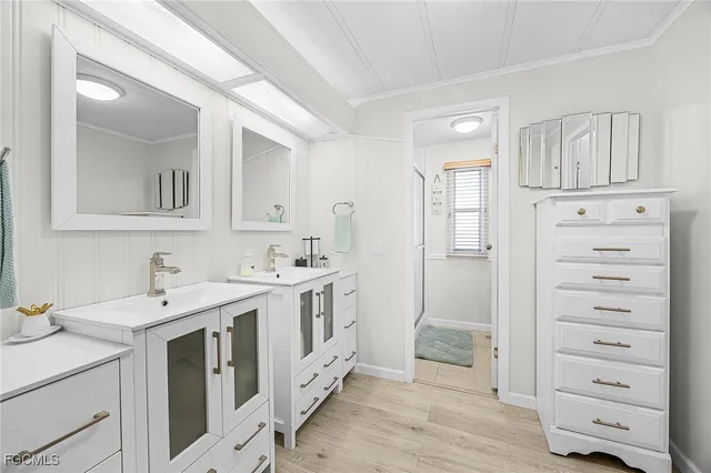 a view of a sink and a mirror