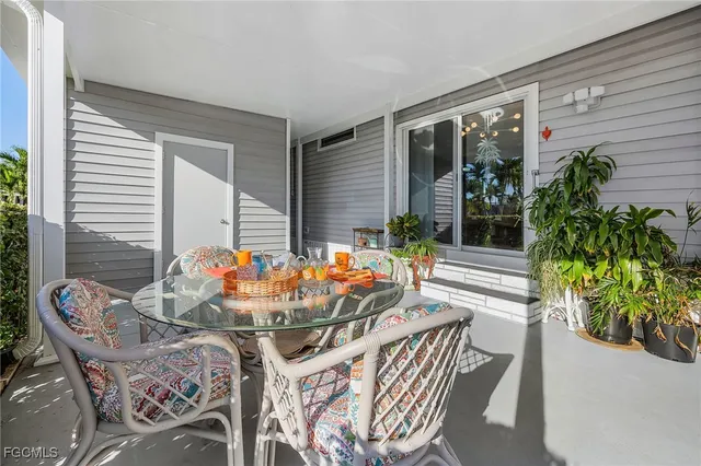 a outdoor dining space with furniture and garden