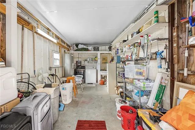 a bedroom with furniture and a book shelf