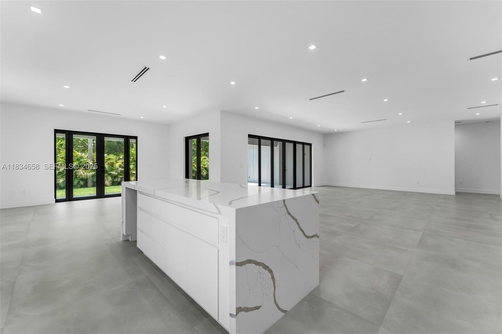 8220 Southwest 193rd Terrace Cutler Bay, FL 33157 - Photo 17 of 59 a view of livingroom and hardwood floor