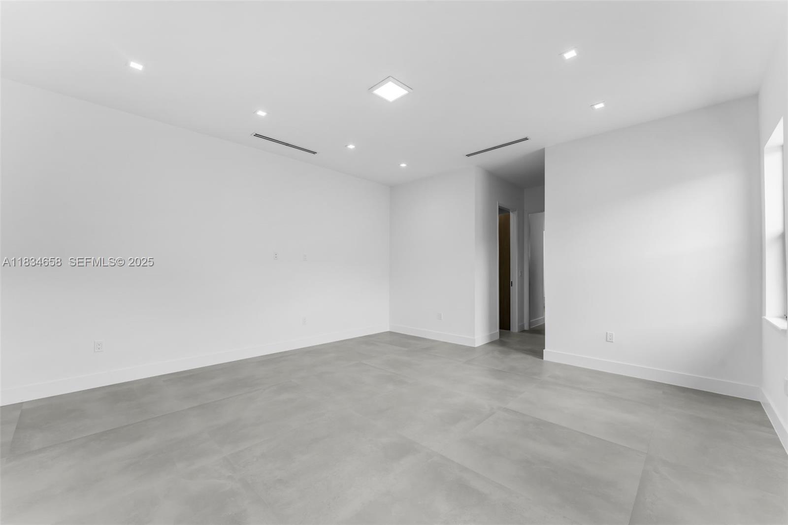 8220 Southwest 193rd Terrace Cutler Bay, FL 33157 - Photo 21 of 59 an empty room with an entryway