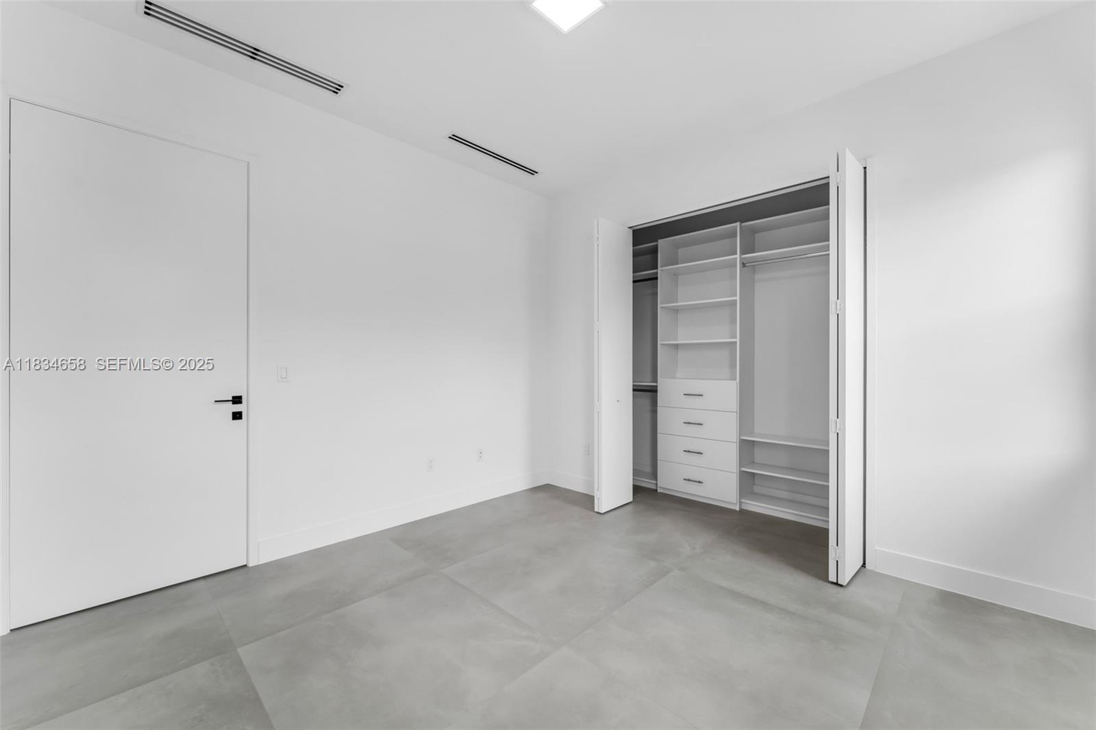 8220 Southwest 193rd Terrace Cutler Bay, FL 33157 - Photo 28 of 59 a view of an empty room