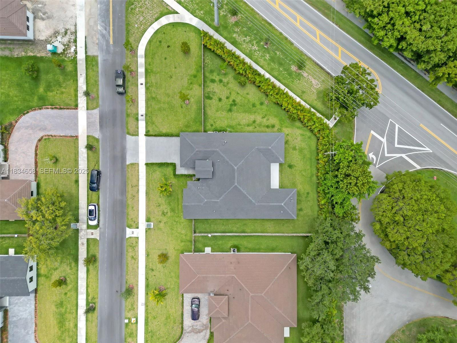 8220 Southwest 193rd Terrace Cutler Bay, FL 33157 - Photo 45 of 59 an aerial view of a house
