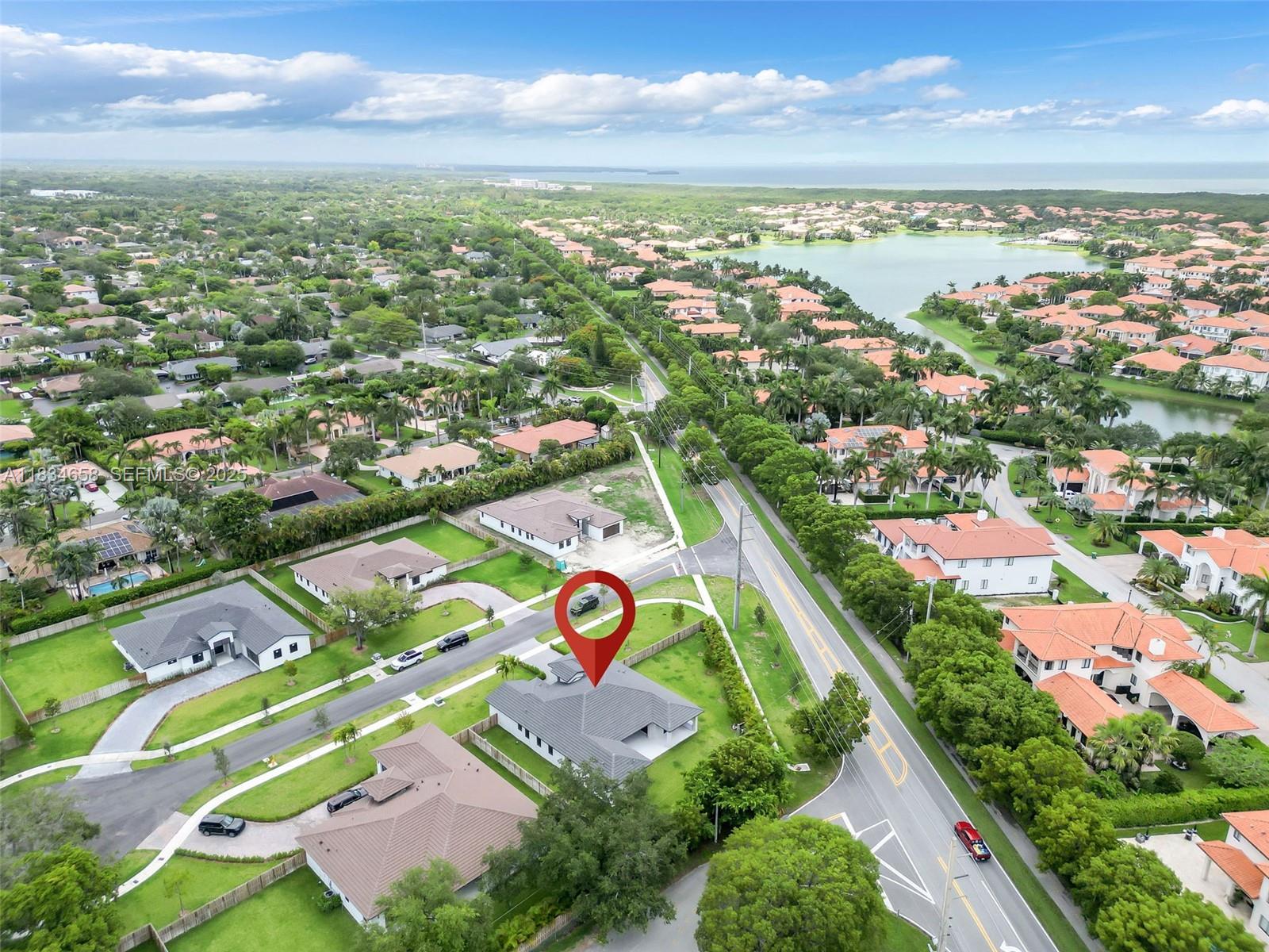 8220 Southwest 193rd Terrace Cutler Bay, FL 33157 - Photo 46 of 59 an aerial view of residential houses with outdoor space