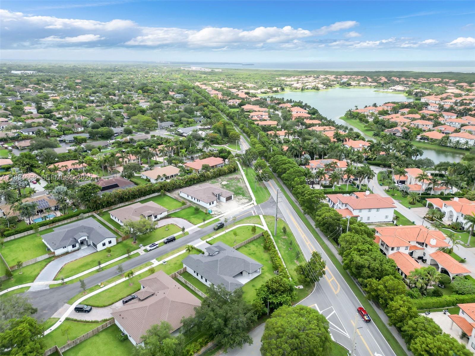 8220 Southwest 193rd Terrace Cutler Bay, FL 33157 - Photo 47 of 59 an aerial view of residential houses with outdoor space