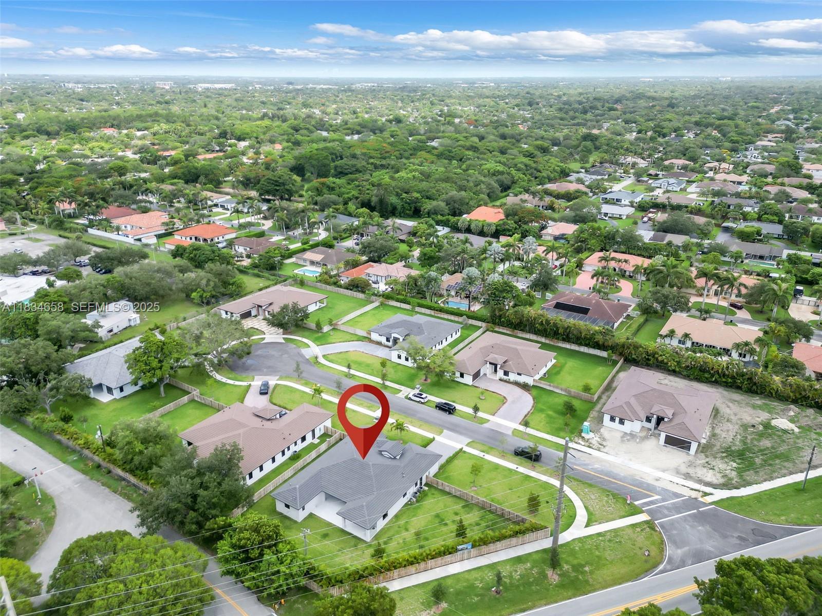 8220 Southwest 193rd Terrace Cutler Bay, FL 33157 - Photo 48 of 59 an aerial view of residential houses with outdoor space