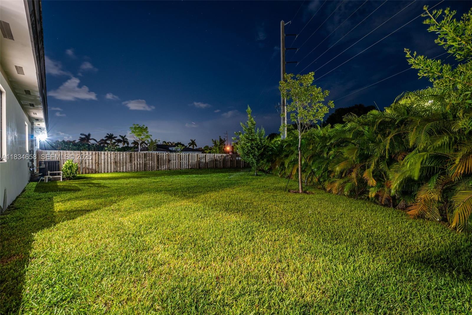 8220 Southwest 193rd Terrace Cutler Bay, FL 33157 - Photo 53 of 59 a view of a garden