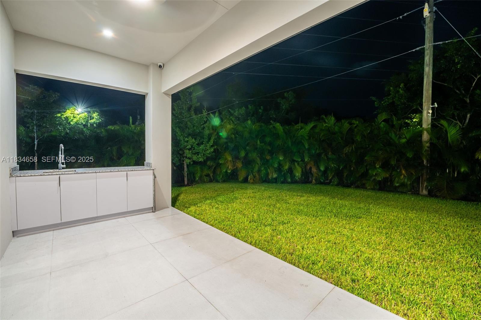 8220 Southwest 193rd Terrace Cutler Bay, FL 33157 - Photo 55 of 59 a view of a backyard of the house
