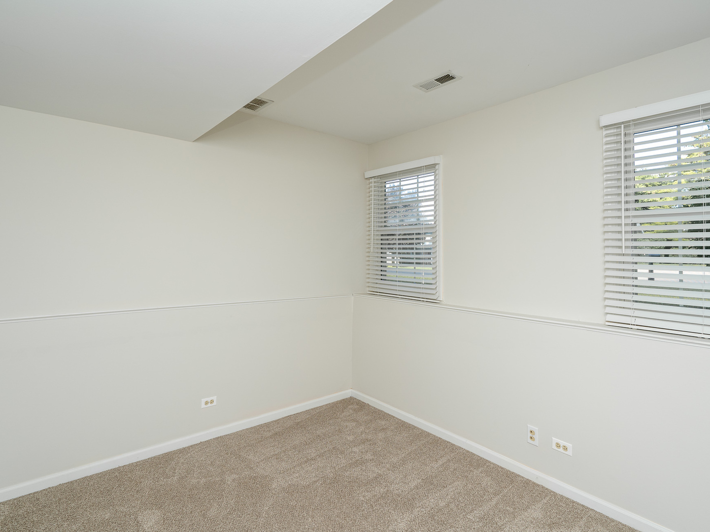 446 Hunters Way Fox River Grove, IL 60021 - Photo 14 of 23 an empty room with windows