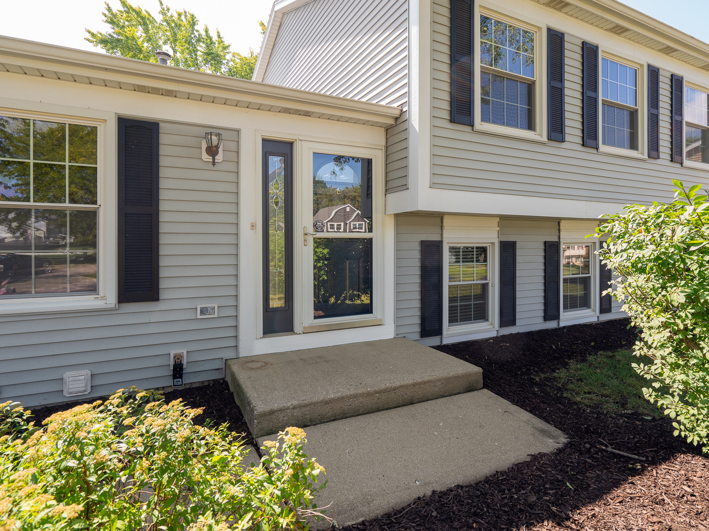 446 Hunters Way Fox River Grove, IL 60021 - Photo 2 of 23 a view of a house with a yard