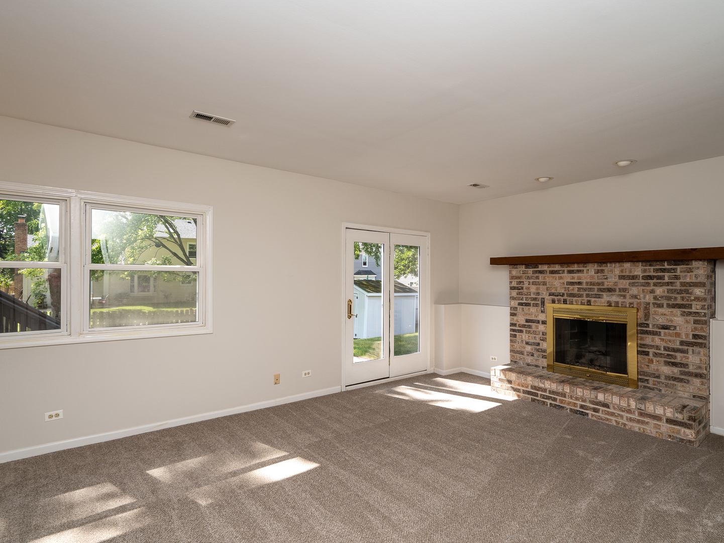 446 Hunters Way Fox River Grove, IL 60021 - Photo 8 of 23 a view of empty room with a fireplace
