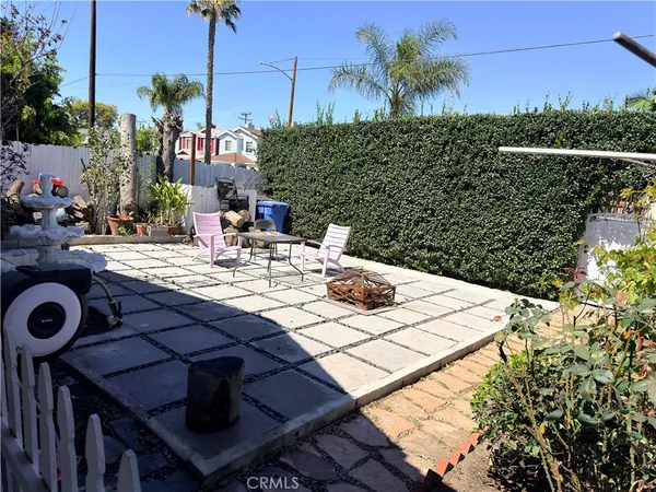 a view of a backyard of a house