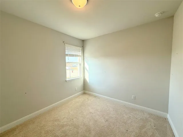 a bathroom with a shower sink vanity and mirror