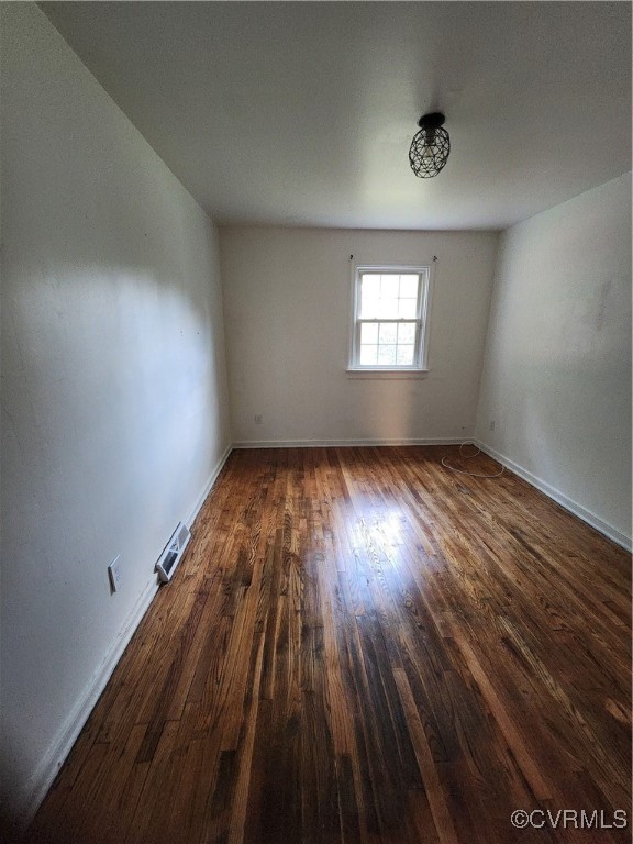 514 Conley Road Richmond, VA 23227 - Photo 11 of 15 Unfurnished room with dark hardwood / wood-style f