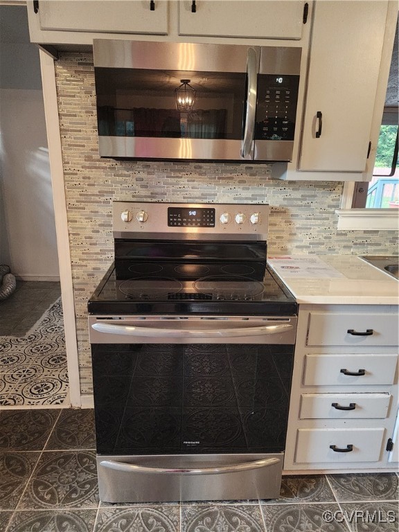 514 Conley Road Richmond, VA 23227 - Photo 14 of 15 Kitchen with white cabinets, stainless steel elect
