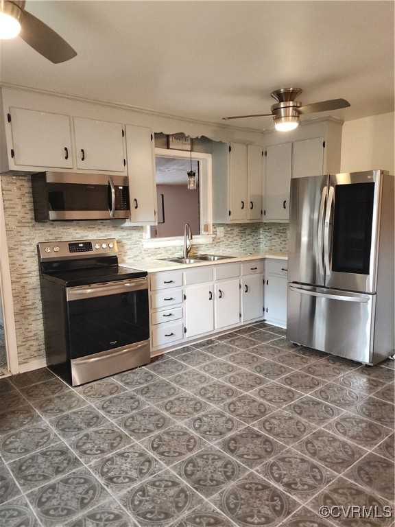 514 Conley Road Richmond, VA 23227 - Photo 4 of 15 Kitchen with tasteful backsplash, ceiling fan, fri