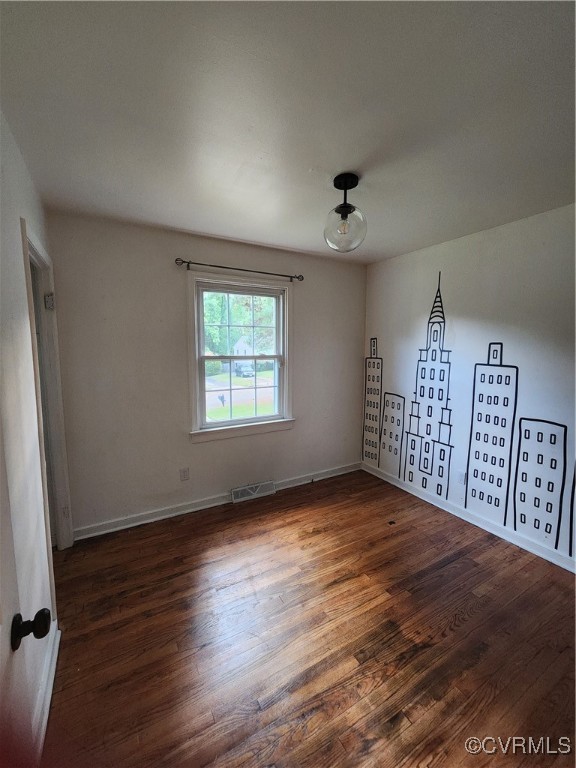 514 Conley Road Richmond, VA 23227 - Photo 8 of 15 Spare room featuring dark hardwood / wood-style fl