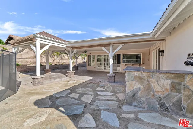 a view of a house with a patio