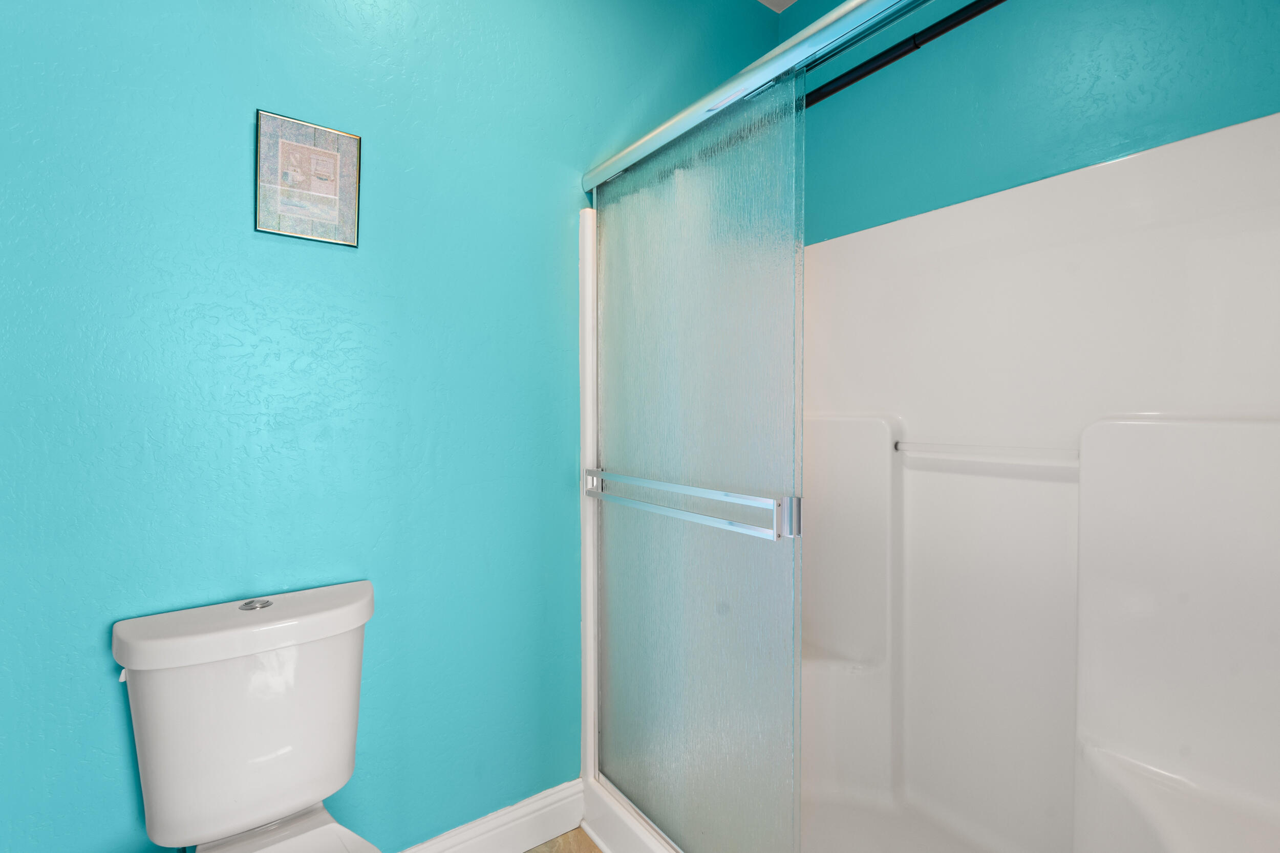 1227 Lithia Way Talent, OR 97540 - Photo 20 of 37 a bathroom with a toilet and a shower