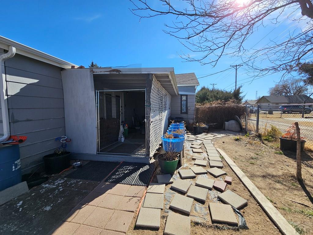 233 East 5th Avenue Springfield, CO 81073 - Photo 24 of 30 a view of a backyard with sitting area