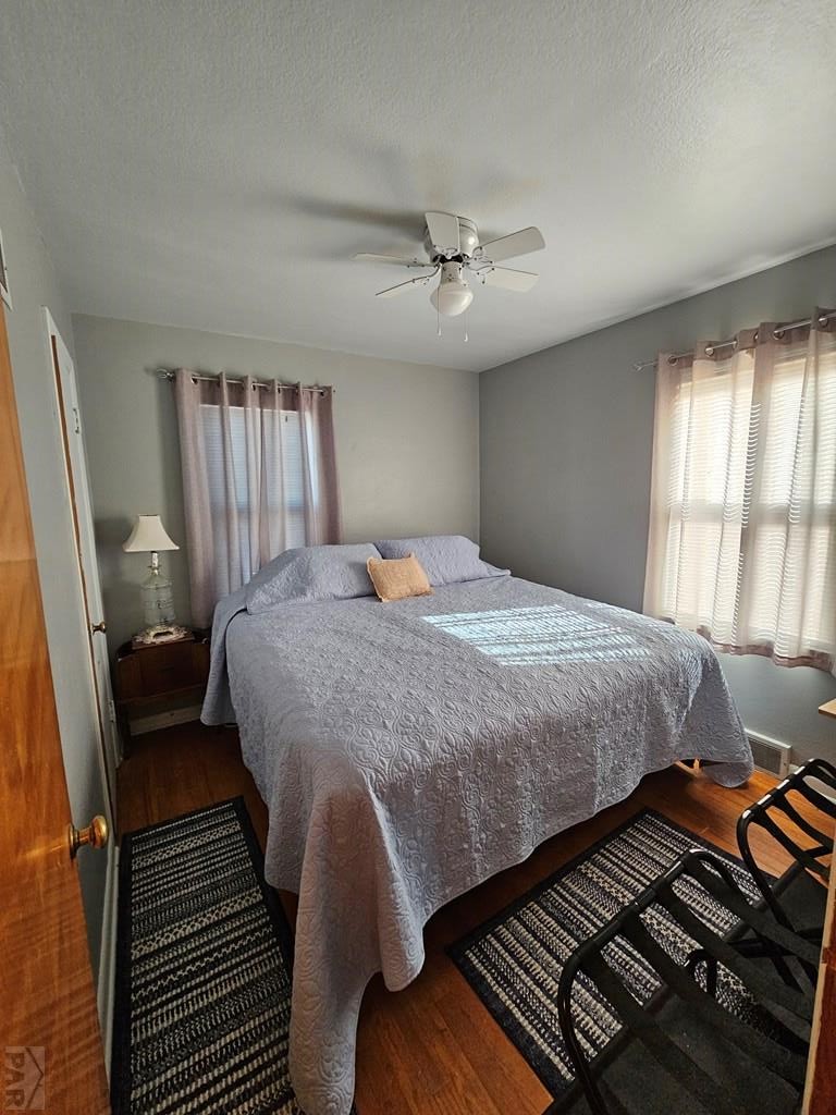 233 East 5th Avenue Springfield, CO 81073 - Photo 4 of 30 a bedroom with a large bed and a window