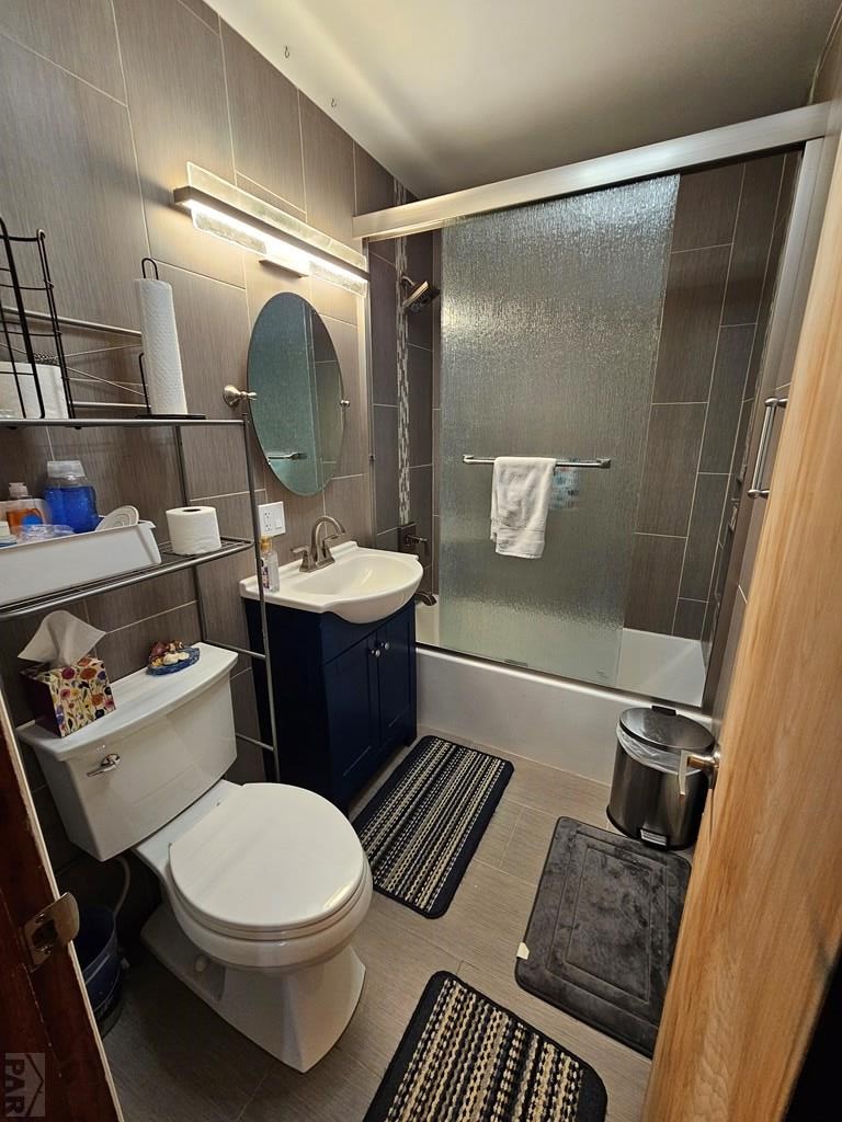 233 East 5th Avenue Springfield, CO 81073 - Photo 5 of 30 a bathroom with a sink toilet and shower