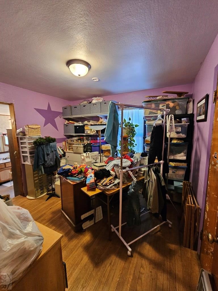 233 East 5th Avenue Springfield, CO 81073 - Photo 6 of 30 a view of a room with lots of wooden furniture