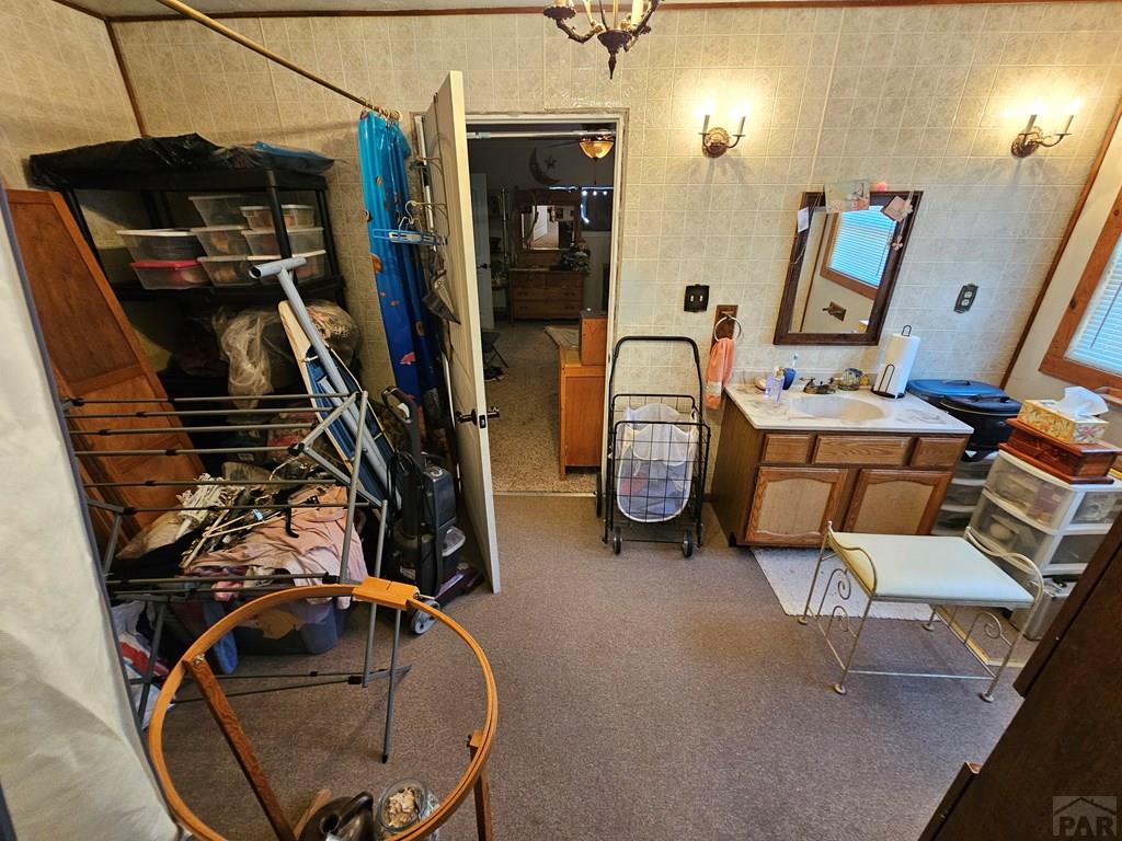 233 East 5th Avenue Springfield, CO 81073 - Photo 7 of 30 a view of a room with gym equipment