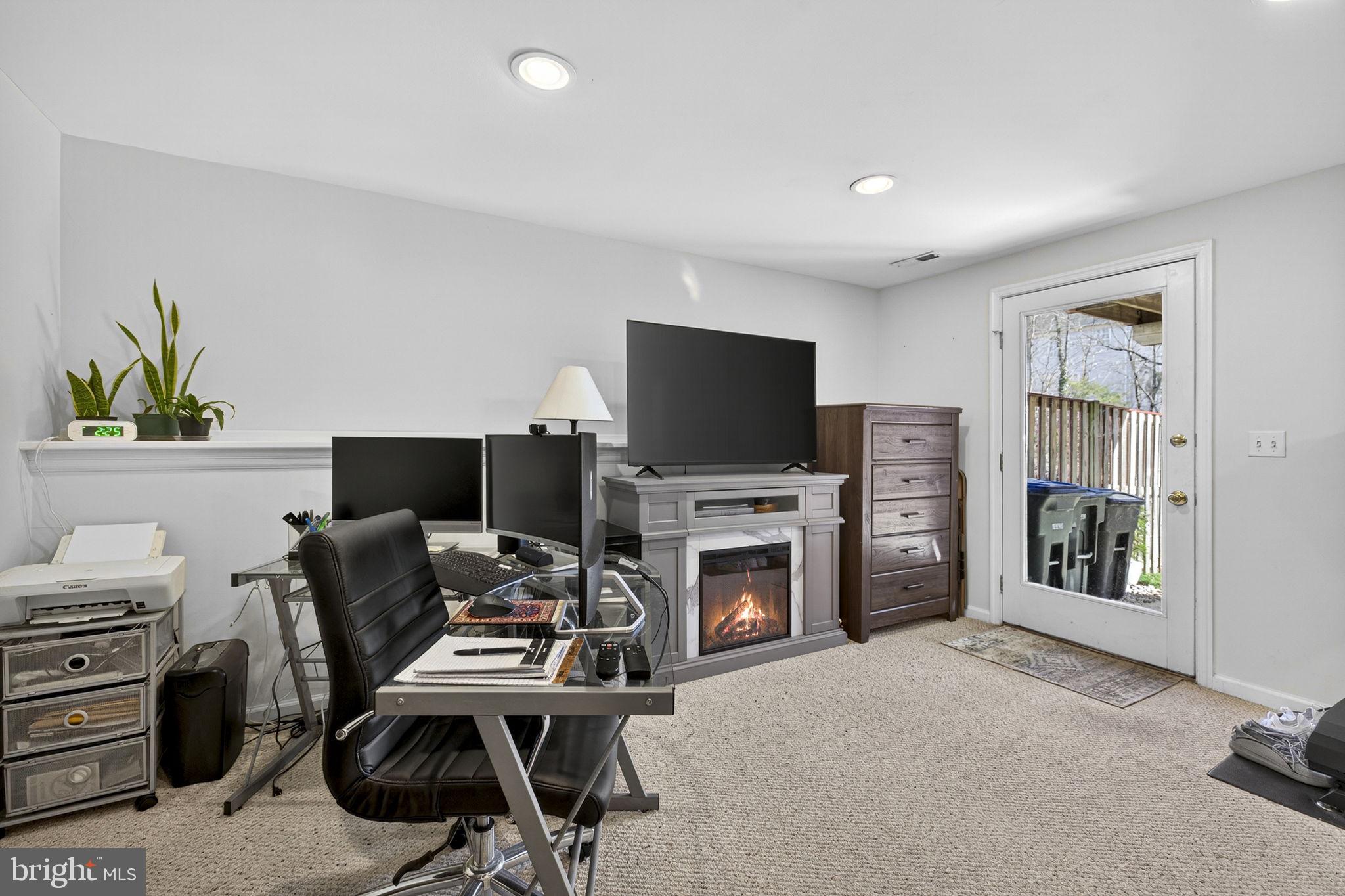 45430 Gable Square Sterling, VA 20164 - Photo 36 of 52 a view of a workspace with furniture and a window
