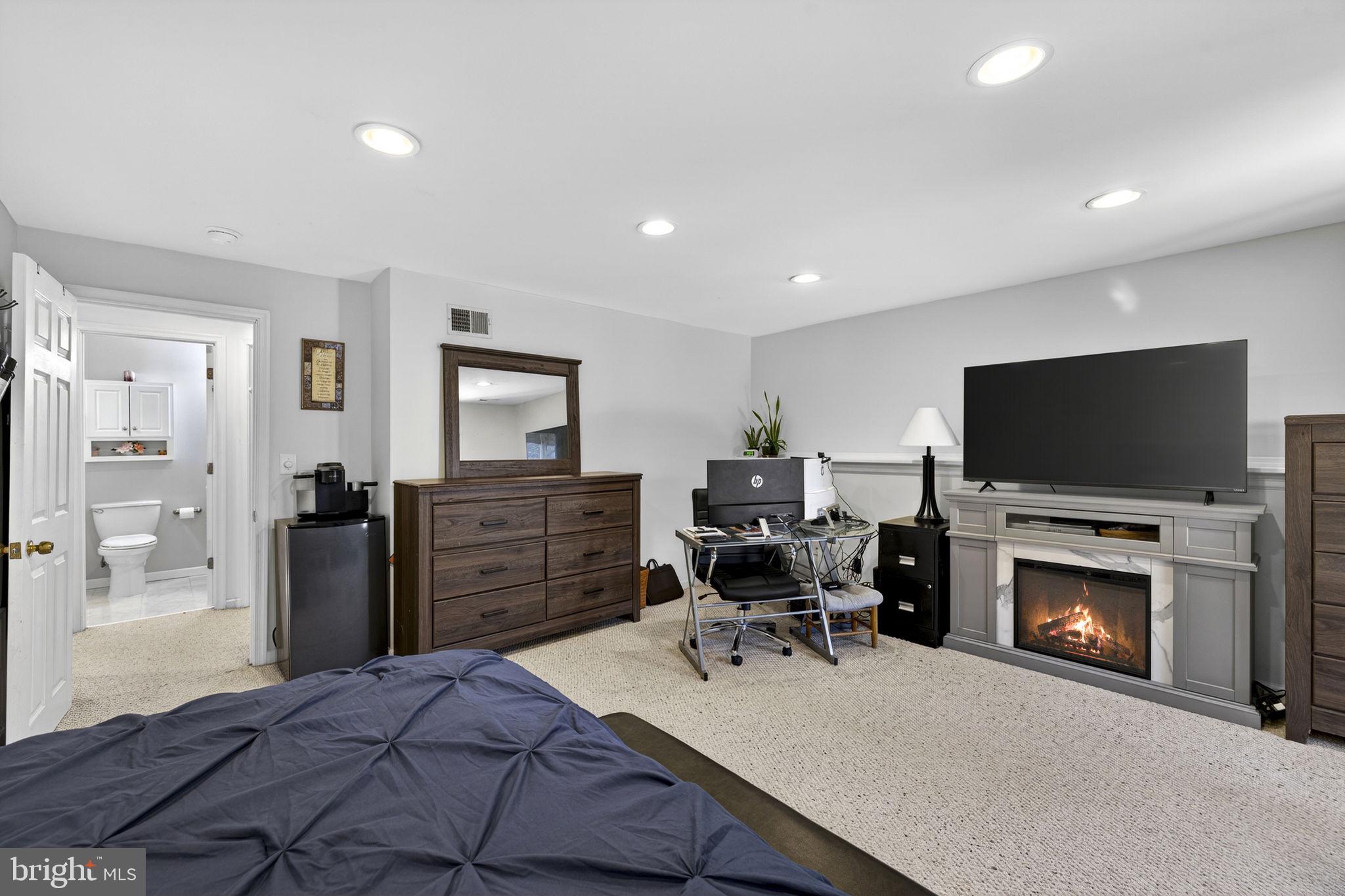 45430 Gable Square Sterling, VA 20164 - Photo 39 of 52 a living room with furniture and a flat screen tv