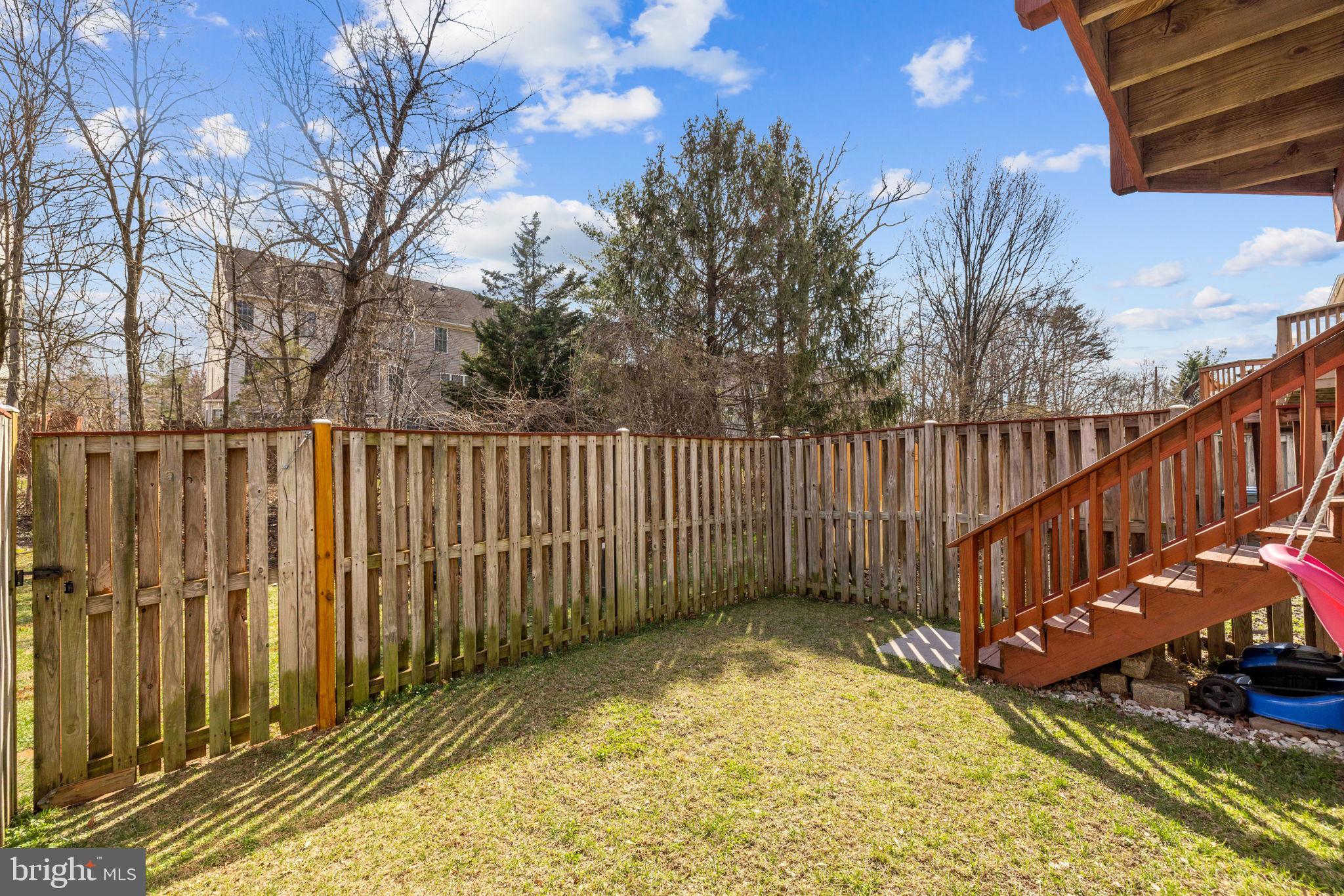 45430 Gable Square Sterling, VA 20164 - Photo 46 of 52 a view of an outdoor space with wooden fence