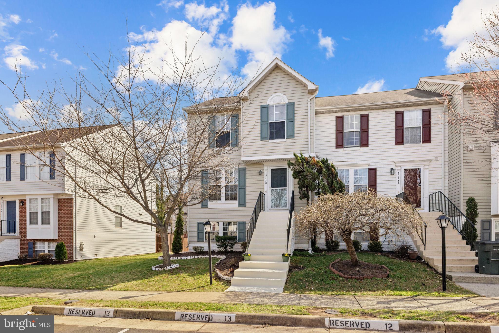45430 Gable Square Sterling, VA 20164 - Photo 47 of 52 a view of a house with a yard