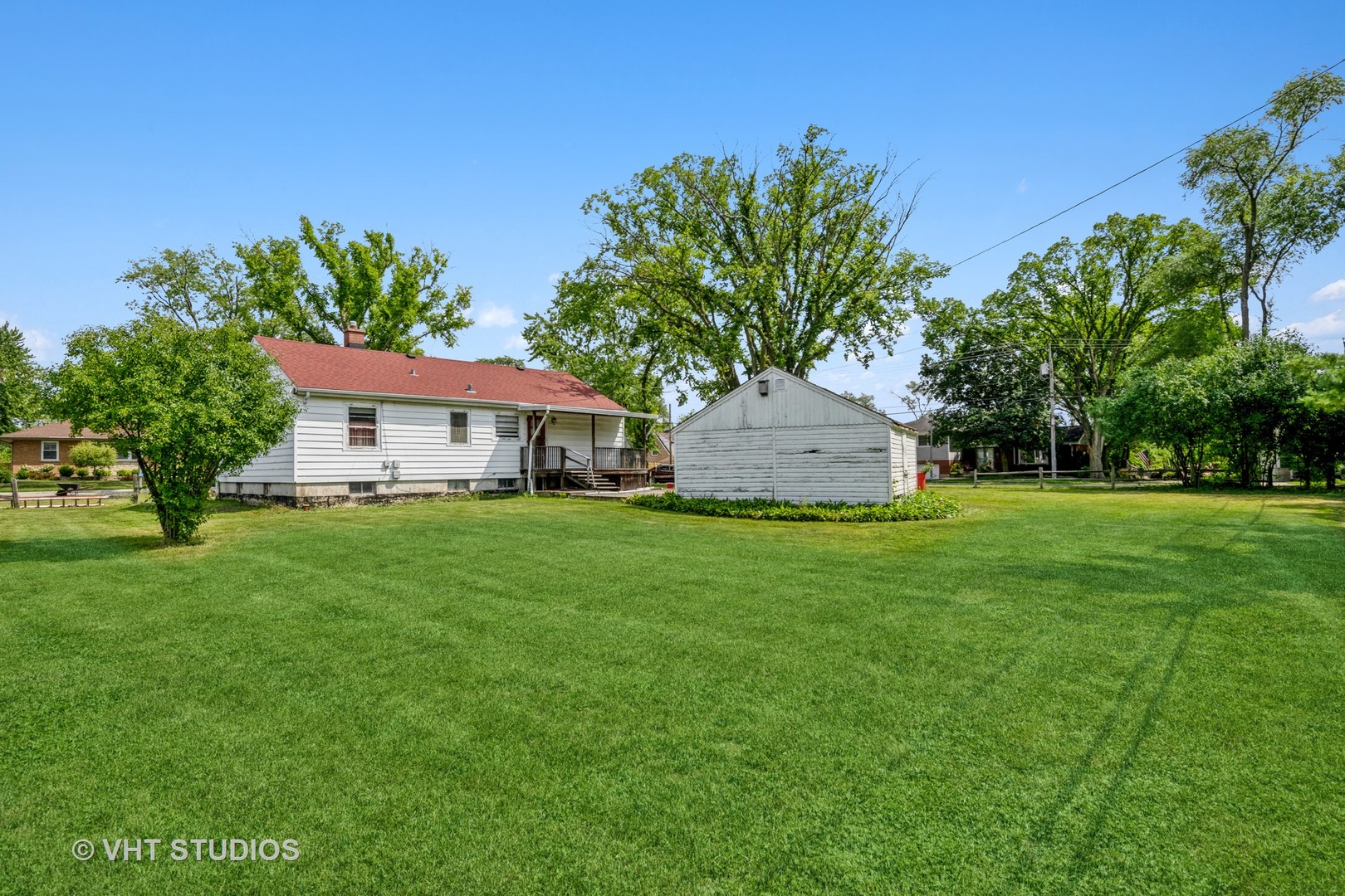 862 South Poplar Avenue Elmhurst, IL 60126 - Photo 6 of 11 a front view of a house with a garden and tree