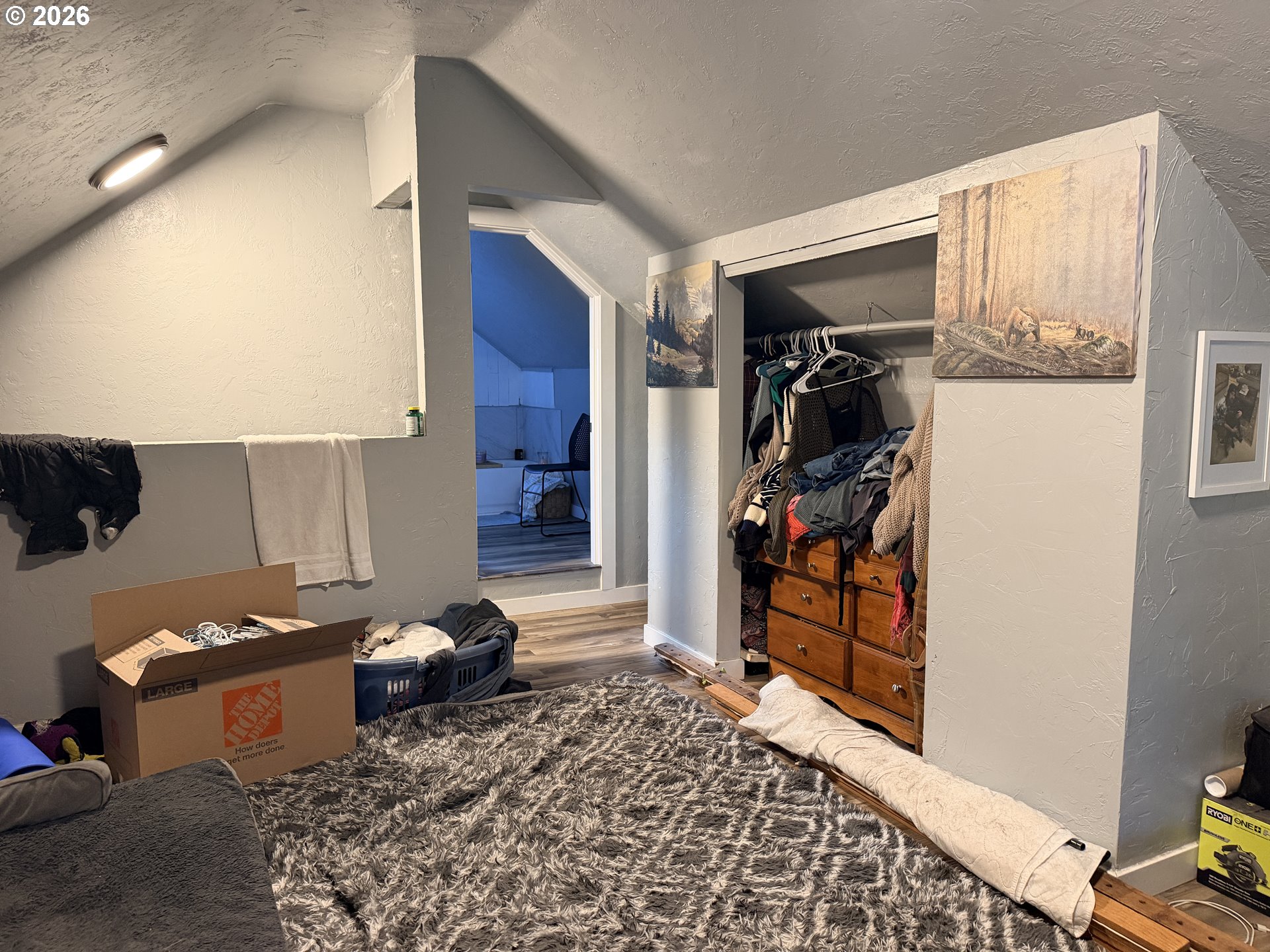 677 Southeast Moffitt Road Waldport, OR 97394 - Photo 25 of 36 a living room with furniture and a rug