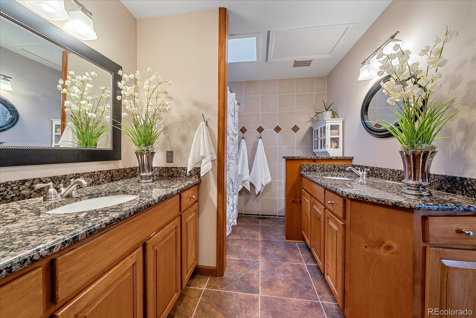 4059 Histead Way Evergreen, CO 80439 - Photo 23 of 37 a kitchen with sink stove and refrigerator