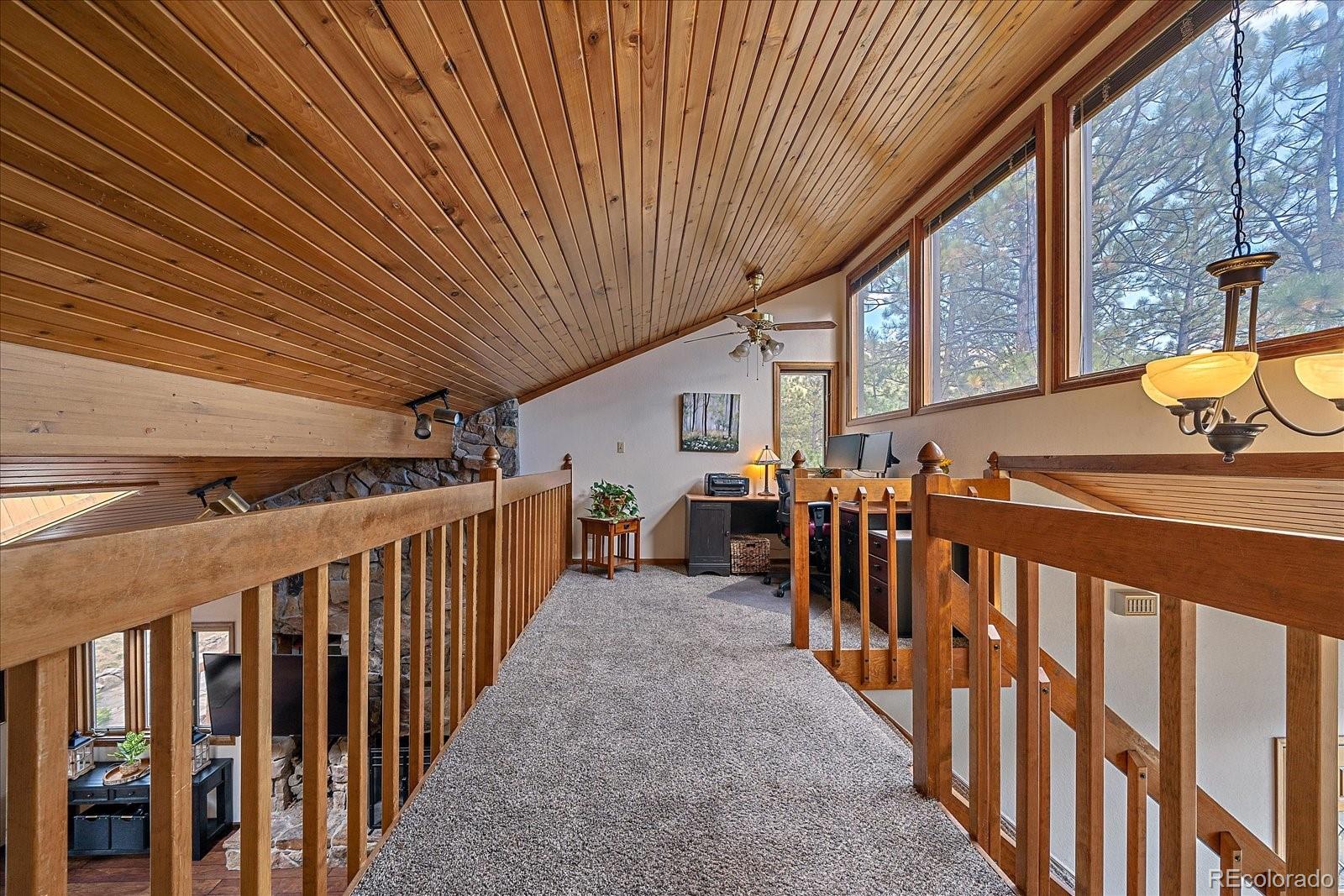 4059 Histead Way Evergreen, CO 80439 - Photo 25 of 37 a view of a porch