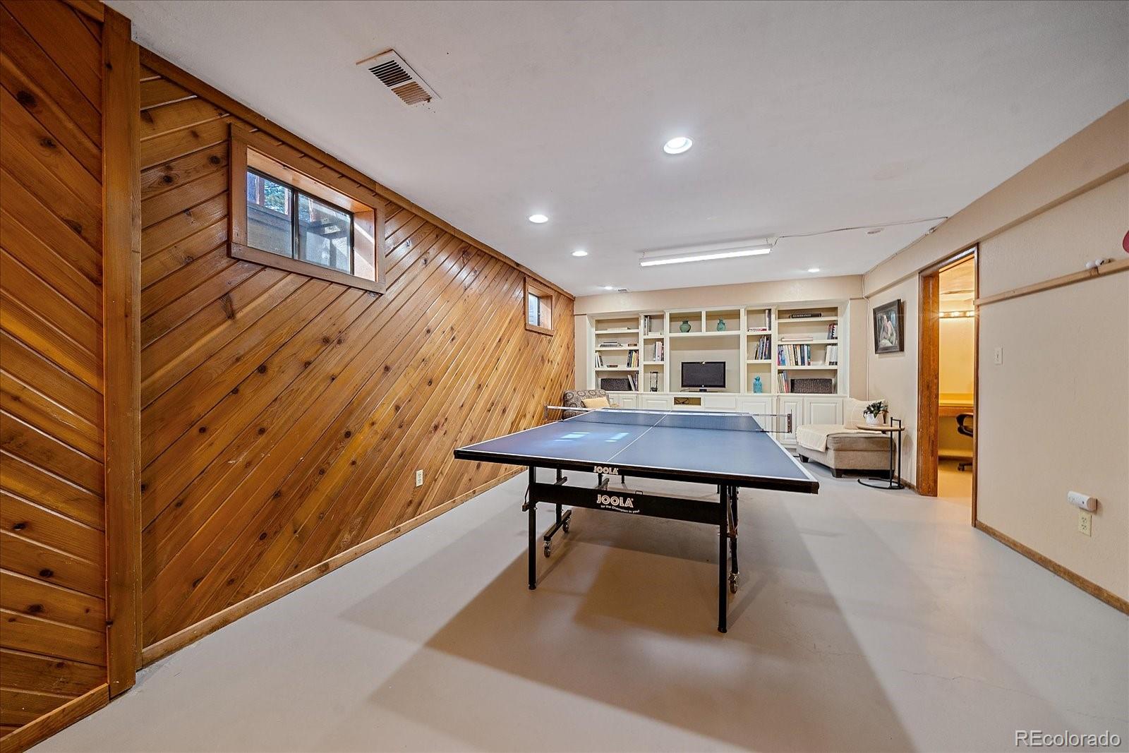4059 Histead Way Evergreen, CO 80439 - Photo 30 of 37 a view of a livingroom with furniture and window