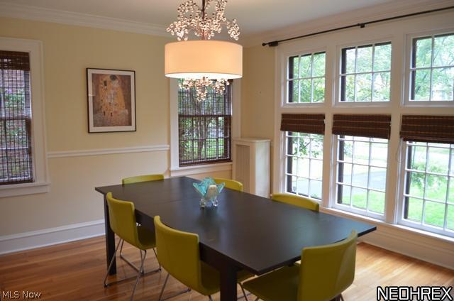 3299 Chalfant Road Cleveland, OH 44120 - Photo 4 of 24 Gracious dining room with floor to ceiling front window, attractive chandelier and extra moldings.